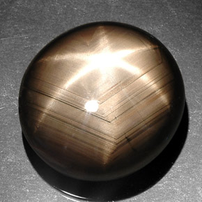 Saphir étoilé noir naturelle coupe ovale, 41,92 ct, opaque