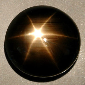 Saphir étoilé noir naturelle coupe roude, 36,25 ct, opaque