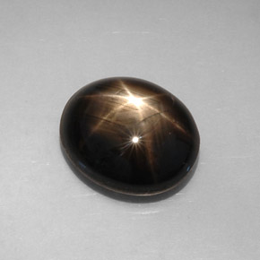 Saphir étoilé noir naturelle coupe ovale, 8,19 ct, opaque