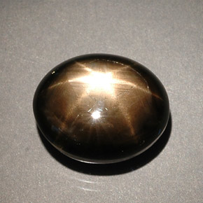 Saphir étoilé noir naturelle coupe ovale, 8,56 ct, opaque