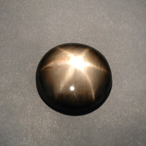 Saphir étoilé noir naturelle coupe ovale, 12,04 ct, opaque