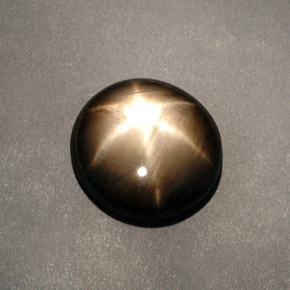Saphir étoilé noir naturelle coupe ovale, 12,04 ct, opaque