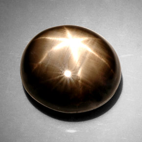 Saphir étoilé noir naturelle coupe ovale, 15,19 ct, opaque