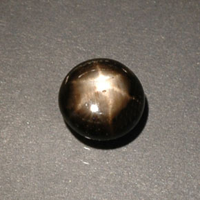 Saphir étoilé noir naturelle coupe roude, 0,60 ct, opaque