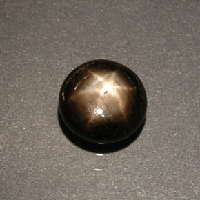 Saphir étoilé noir naturelle coupe roude, 0,60 ct, opaque