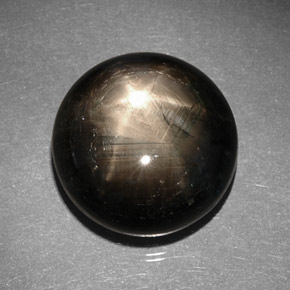 Saphir étoilé noir naturelle coupe roude, 29,57 ct, opaque