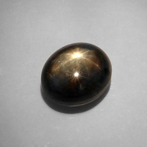 Saphir étoilé noir naturelle coupe ovale, 12,34 ct, opaque