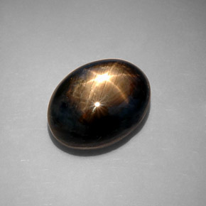Saphir étoilé noir naturelle coupe ovale, 10,65 ct, opaque