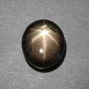 Saphir étoilé noir naturelle coupe ovale, 5,82 ct, opaque