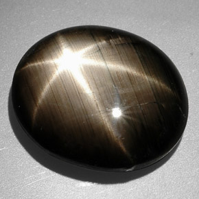 Saphir étoilé noir naturelle coupe ovale, 9,26 ct, opaque