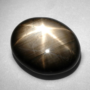 Saphir étoilé noir naturelle coupe ovale, 10,83 ct, opaque