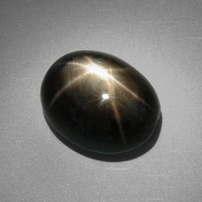 Saphir étoilé noir naturelle coupe ovale, 9,85 ct, opaque