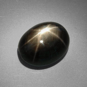 Saphir étoilé noir naturelle coupe ovale, 9,85 ct, opaque