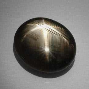 Saphir Étoilé Noire naturelle Coupe ovale, 32.74 ct, Opaque