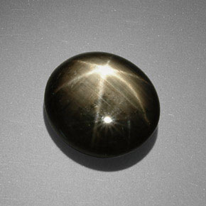 Saphir étoilé noir naturelle coupe ovale, 9,85 ct, opaque