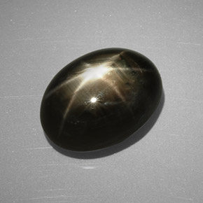 Saphir étoilé noir naturelle coupe ovale, 9,24 ct, opaque