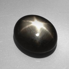 Saphir étoilé noir naturelle coupe ovale, 27,17 ct, opaque