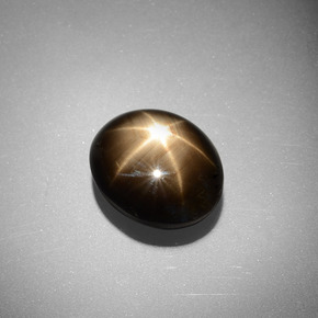 Saphir étoilé Noire naturelle ovale, 6.98 ct, Opaque