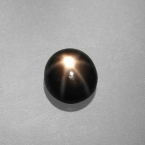 Saphir étoilé noir naturelle coupe roude, 1,09 ct, opaque