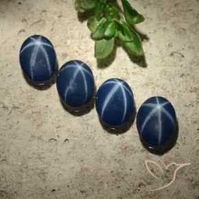 Shop natural 2.43ct Bleu foncé Saphir étoilé gems, ovale, from Thaïlande at GemSelect. In stock, global shipping!
