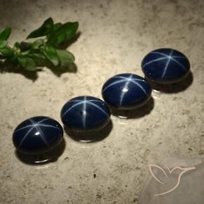 Shop natural 6.11ct Bleu foncé Saphir étoilé gems, ovale, from Thaïlande at GemSelect. In stock, global shipping!