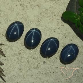 Shop natural 4.04ct Bleu foncé Saphir étoilé gems, ovale, from Thaïlande at GemSelect. In stock, global shipping!