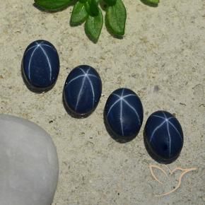 Shop natural 3.89ct Bleu foncé Saphir étoilé gems, ovale, from Thaïlande at GemSelect. In stock, global shipping!