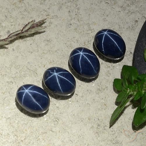 Shop natural 6.34ct Bleu foncé Saphir étoilé gems, ovale, from Thaïlande at GemSelect. In stock, global shipping!