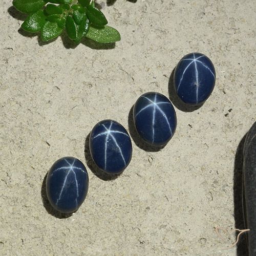 Shop natural 4.05ct Bleu foncé Saphir étoilé gems, ovale, from Thaïlande at GemSelect. In stock, global shipping!