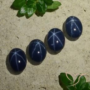 Shop natural 4.08ct Bleu foncé Saphir étoilé gems, ovale, from Thaïlande at GemSelect. In stock, global shipping!