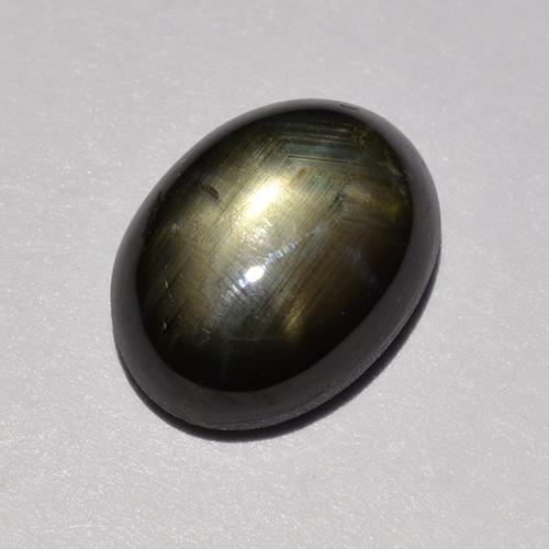 Saphir étoilé noir naturelle coupe ovale, 1,47 ct, opaque