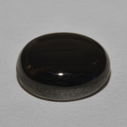 Saphir étoilé Noire naturelle ovale, 20.30 ct, Opaque