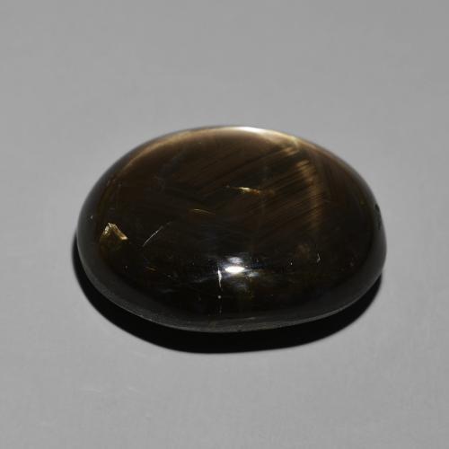 Saphir étoilé Noire naturelle ovale, 34.34 ct, Opaque