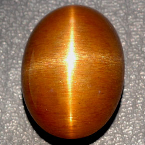 Pierre de soleil étoilée Brun doré naturelle Coupe ovale, 36.54 ct, Opaque
