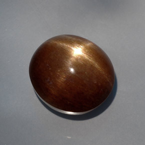 Pierre de soleil étoilée Brun doré naturelle Coupe ovale, 26.66 ct, Opaque