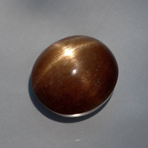 Pierre de soleil étoilée Brun doré naturelle Coupe ovale, 26.66 ct, Opaque