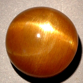 Pierre de soleil étoilée Brun doré naturelle Coupe roude, 5.43 ct, Opaque