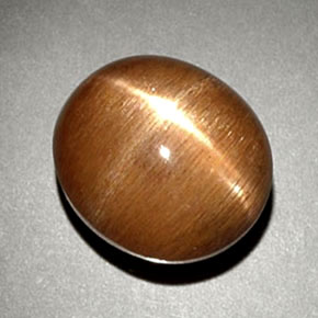 Pierre de soleil étoilée Brun doré naturelle Coupe ovale, 6.93 ct, Opaque