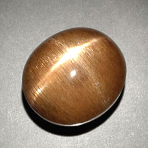 Pierre de soleil étoilée Brun doré naturelle Coupe ovale, 6.93 ct, Opaque