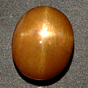 Pierre de soleil étoilée Brun doré naturelle Coupe ovale, 4.20 ct, Opaque
