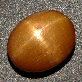 Pierre de soleil étoilée Brun doré naturelle Coupe ovale, 4.20 ct, Opaque