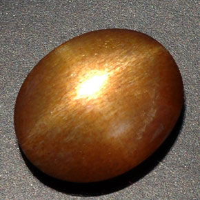 Pierre de soleil étoilée marron naturelle coupe ovale, 8,09 ct, opaque