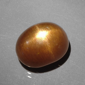 Pierre de soleil étoilée Brun doré naturelle Coupe ovale, 3.93 ct, Opaque