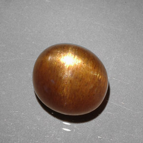 Pierre de soleil étoilée brun doré naturelle coupe ovale, 2,75 ct, opaque
