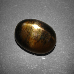 Pierre de soleil étoilée brun doré naturelle coupe ovale, 11,53 ct, opaque
