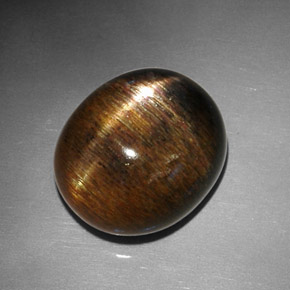 Pierre de soleil étoilée marron naturelle coupe ovale, 12,68 ct, opaque