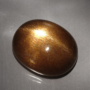Pierre de soleil étoilée Brun doré naturelle Coupe ovale, 23.68 ct, Opaque