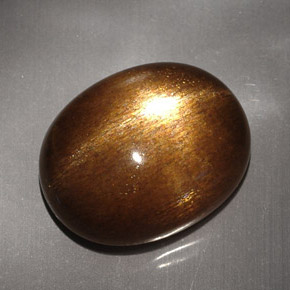 Pierre de soleil étoilée Brun doré naturelle Coupe ovale, 23.68 ct, Opaque