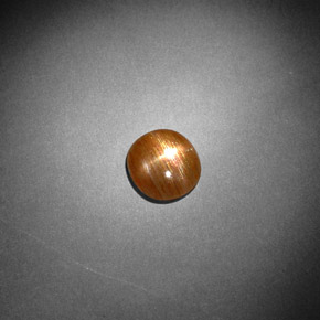 Pierre de soleil étoilée Brun doré naturelle Coupe ovale, 0.85 ct, Opaque