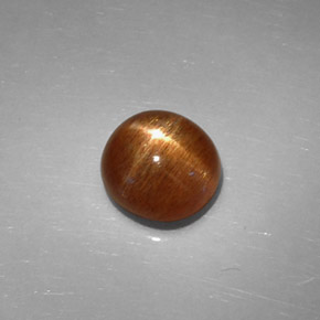 Pierre de soleil étoilée brun doré naturelle coupe ovale, 2,37 ct, opaque